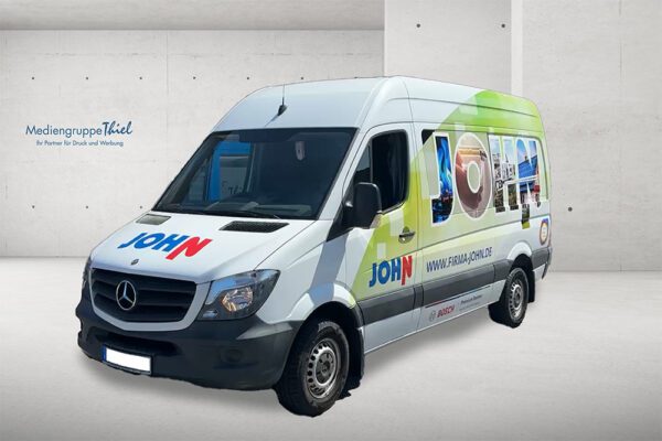 Mercedes Sprinter mit moderner Teilfolierung im Corporate Design der Firma John, umgesetzt von der Mediengruppe Thiel.