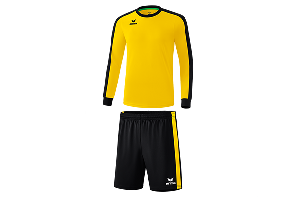 Erima Fußball-Trikotset gelb/schwarz mit Langarmtrikot und schwarzer Short, Frontansicht auf hellem Verlaufshintergrund.